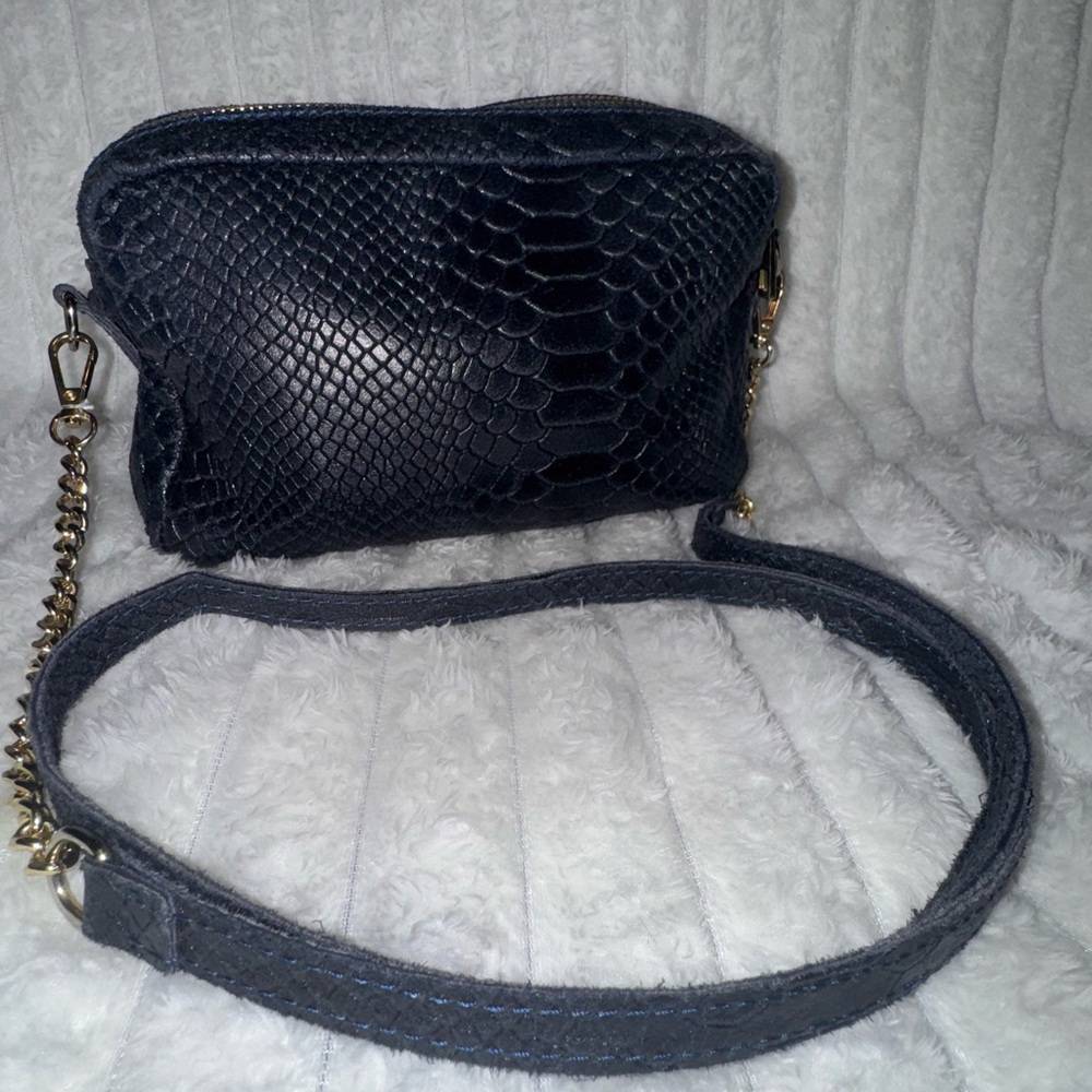 Genuine leather Uno Alla Volta handbag.